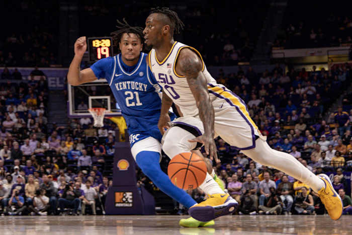 Feb 21, 2024; Baton Rouge, Louisiana, USA; LSU Tigers guard Trae Hannibal (0) dribbles against Kentucky Wildcats guard D.J. Wagner (21) during the first half of the game at Pete Maravich Assembly Center. Mandatory Credit: Stephen Lew-USA TODAY Sports